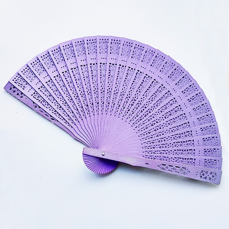 Siopsrl | Women's fan made of elegant, intricately perforated material Siopsrl
