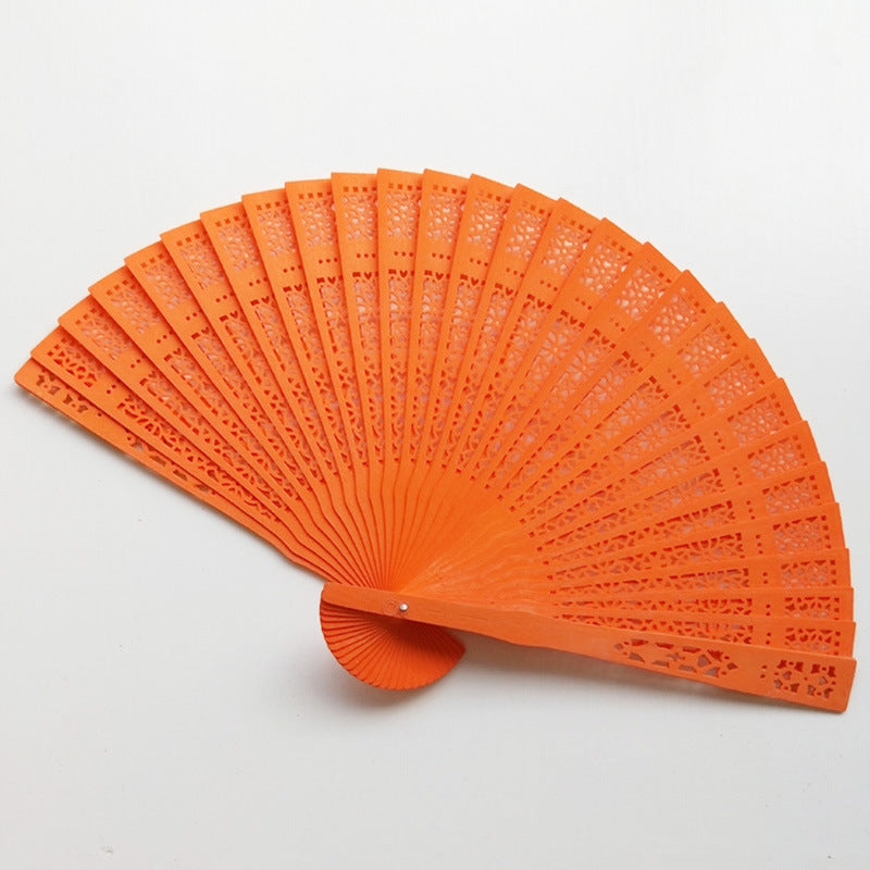 Siopsrl | Women's fan made of elegant, intricately perforated material Siopsrl