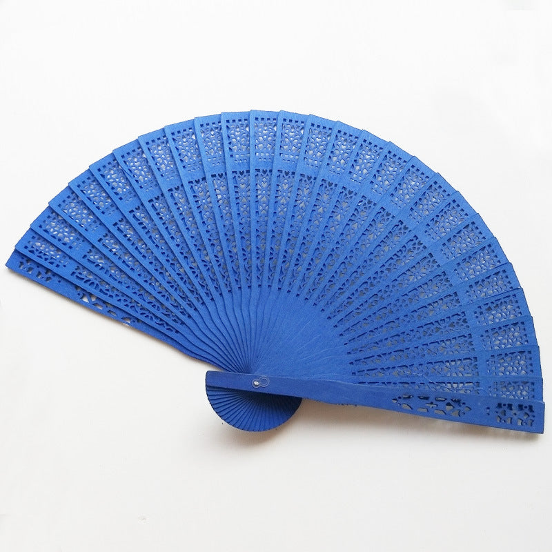 Siopsrl | Women's fan made of elegant, intricately perforated material Siopsrl
