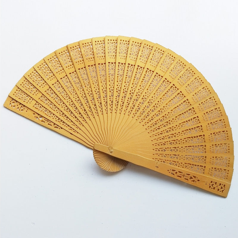 Siopsrl | Women's fan made of elegant, intricately perforated material Siopsrl