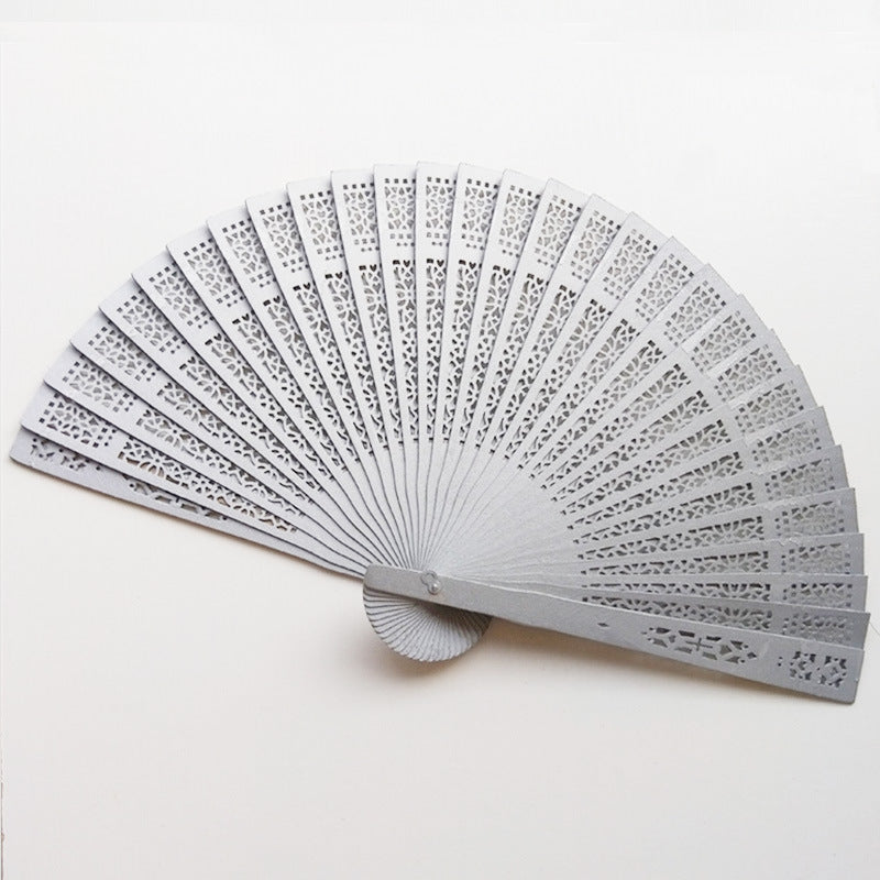 Siopsrl | Women's fan made of elegant, intricately perforated material Siopsrl