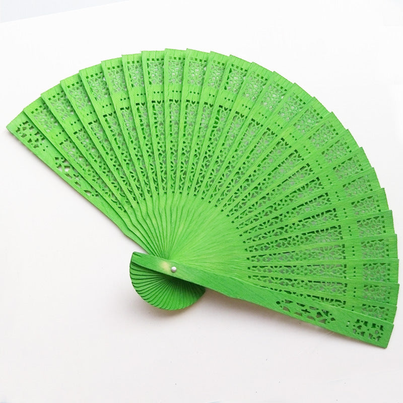 Siopsrl | Women's fan made of elegant, intricately perforated material Siopsrl
