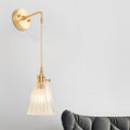 Siopsrl| A wall light with a bulb and conical shade made of clear, textured glass, industrial bedroom wall light fixture