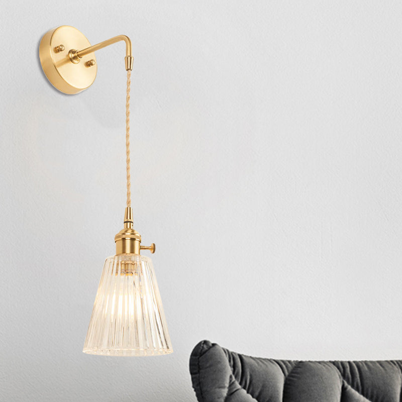 Siopsrl| A wall light with a bulb and conical shade made of clear, textured glass, industrial bedroom wall light fixture