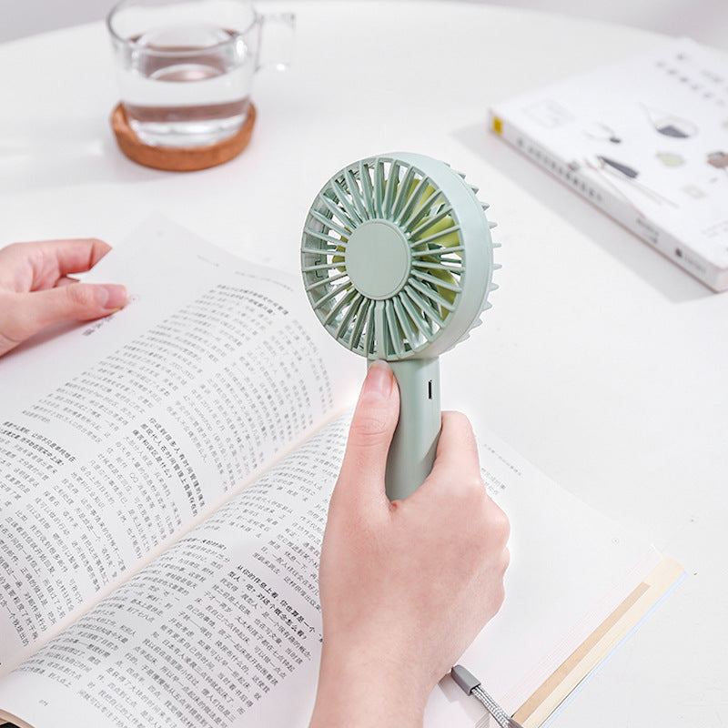 Siopsrl | Unisex nan compact portable hand fan with rechargeable battery and USB charging port quiet operation self-standing Siopsrl