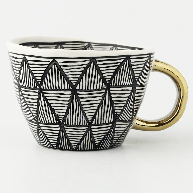 Siopsrl| Cup with abstract geometric pattern and gold handle