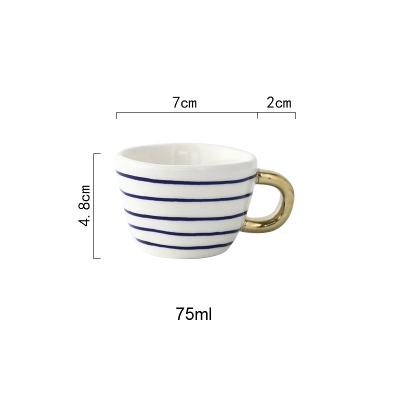 Siopsrl| Cup with abstract geometric pattern and gold handle