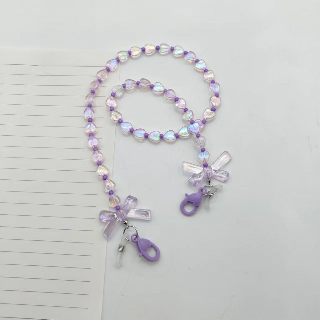 Siopsrl | Fashionable glasses holder chain with heart and flower motifs Siopsrl