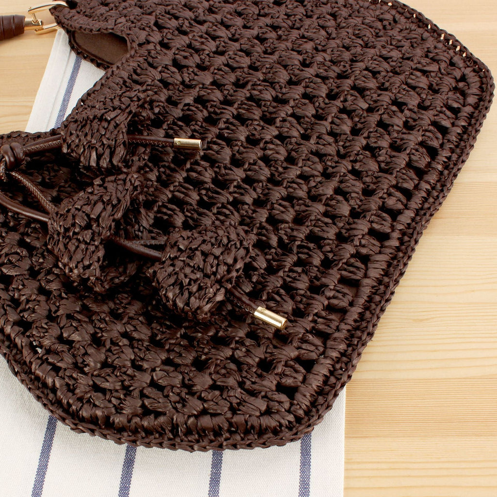 Siopsrl | Handbag Made from Handcrafted Natural Material with Unique Tassel Pendant Siopsrl