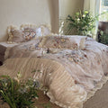 Luxurious bedding set made of cotton satin with floral watercolor print, gathered satin border, and frill pillow
