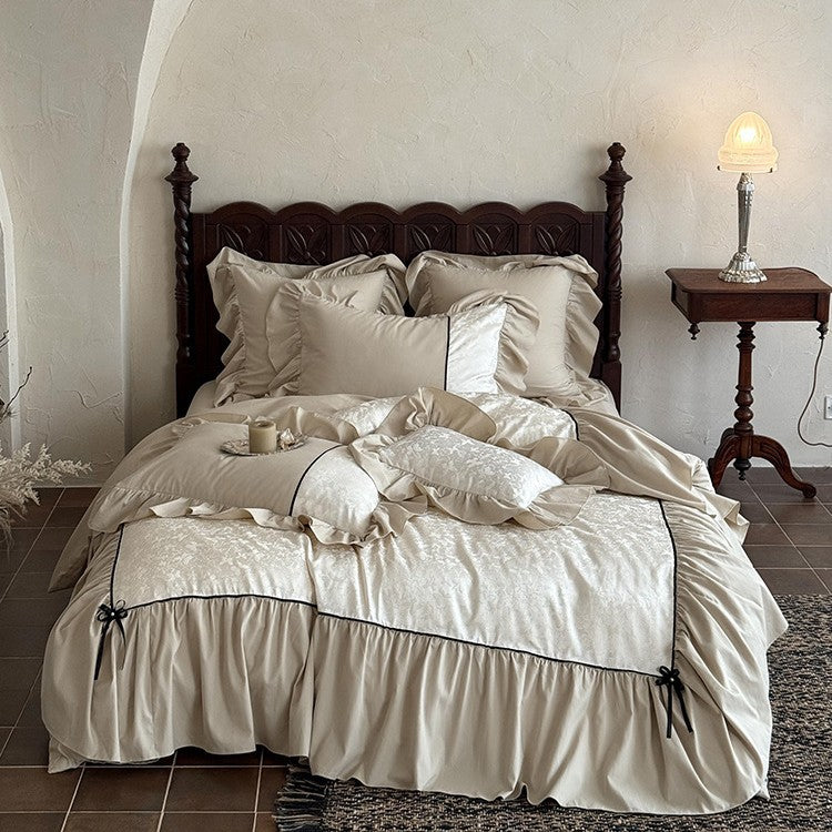 Romantic bed set with frill, jacquard relief and decorative ribbon
