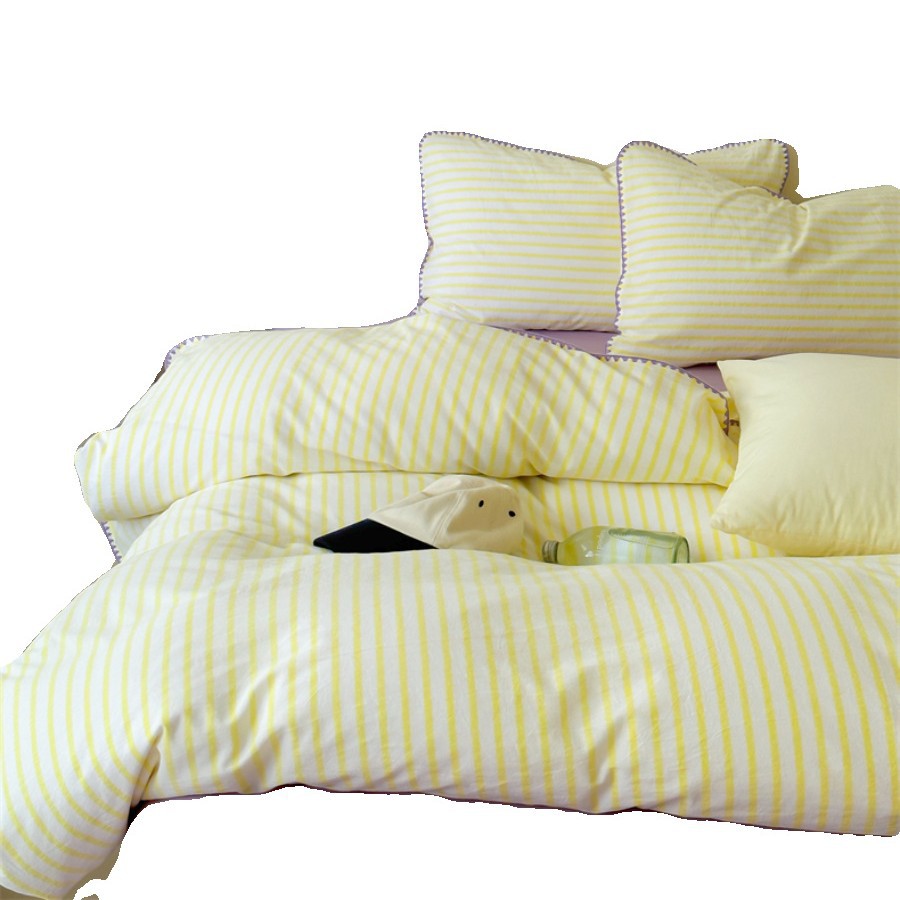 Striped cotton percale bedding set with contrasting decorative piping