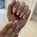 Siopsrl | Artificial nail set with elegant French design and creative accents Siopsrl