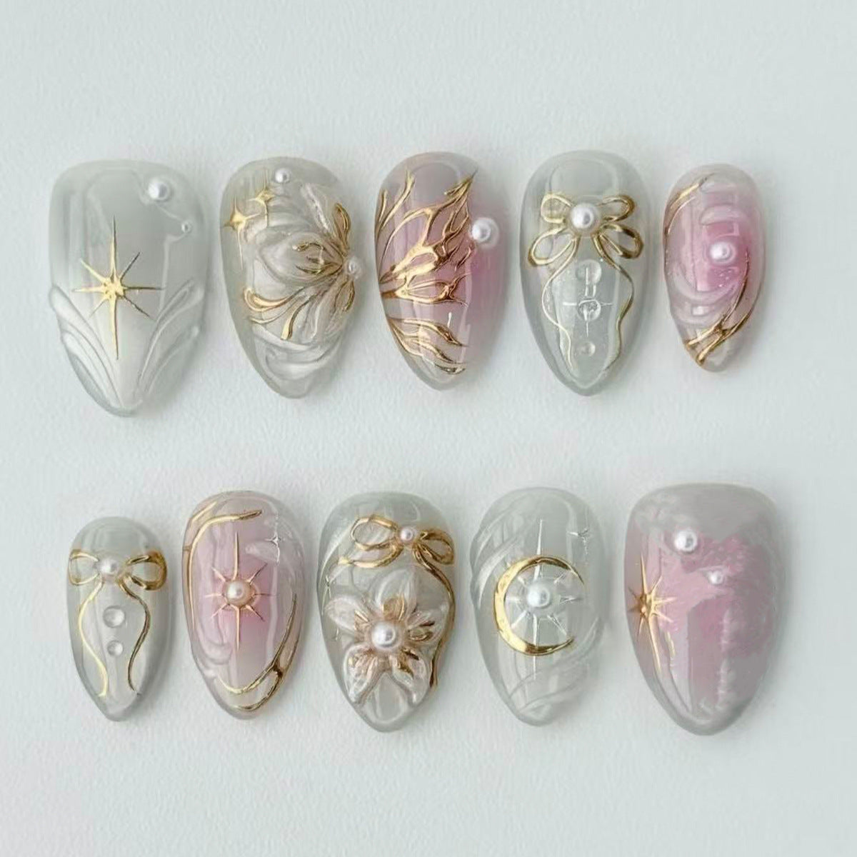 Siopsrl | Artificial nail set with filigree golden accents Siopsrl