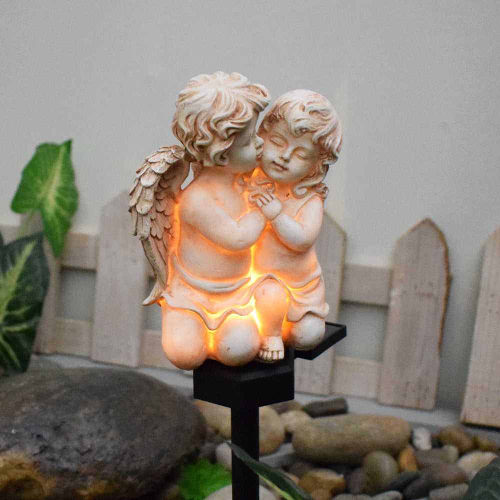 Decorative Solar Garden Stake Statue Resin Girl Figurine With Integrated Solar LED And Weatherproof Spike Siopsrl