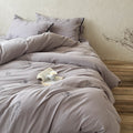 Breathable cotton-linen bedding set with delicate floral embroidery and bow closure