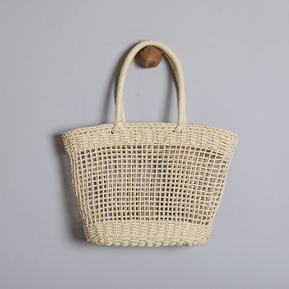 Basket bag made of natural raffia with sturdy carrying handles Siopsrl