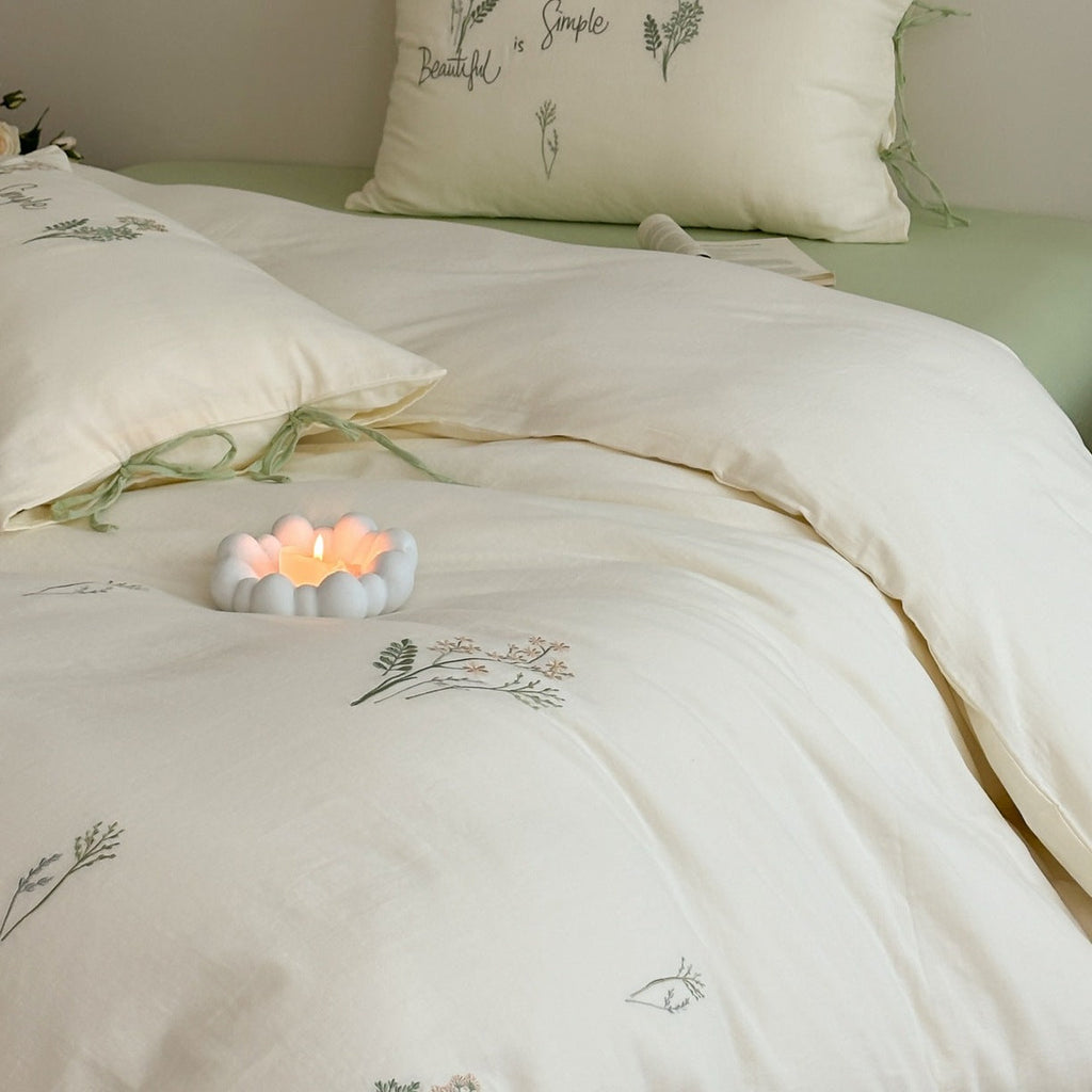 Delicate embroidered cotton bedding set with gentle botanical embroidery and bow ties Bowlift