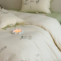Delicate embroidered cotton bedding set with gentle botanical embroidery and bow ties Bowlift