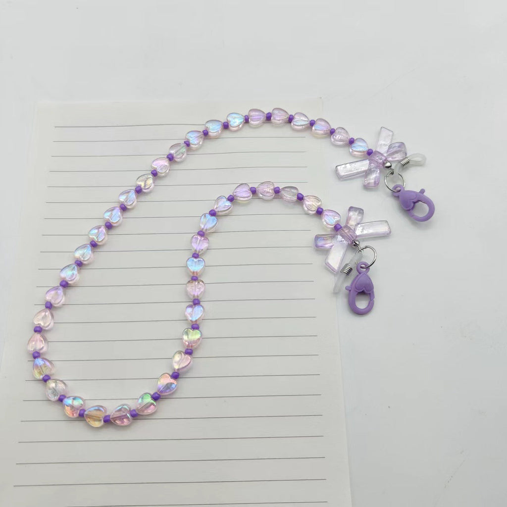 Siopsrl | Fashionable glasses holder chain with heart and flower motifs Siopsrl