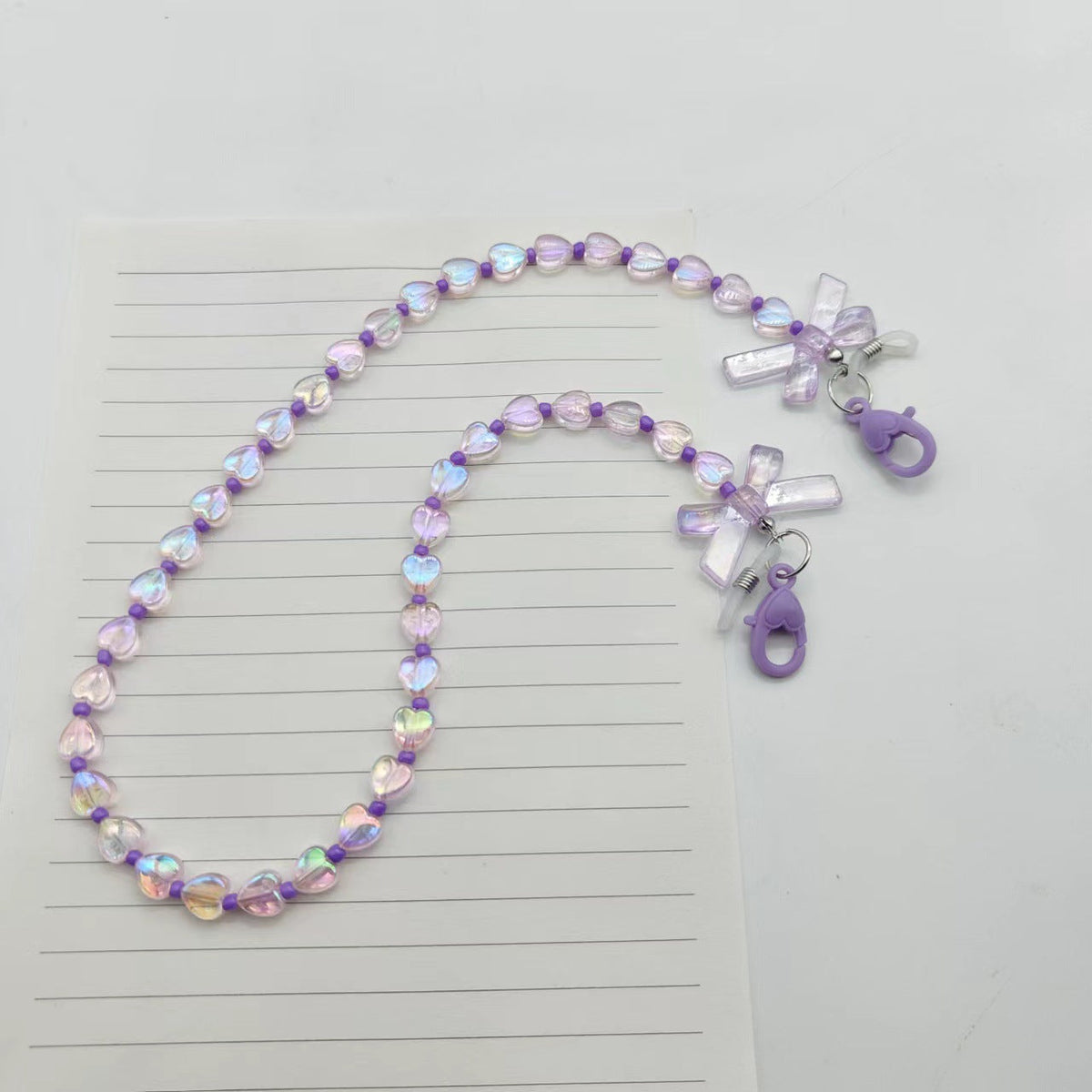 Siopsrl | Fashionable glasses holder chain with heart and flower motifs Siopsrl