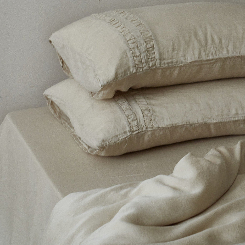Linen bedding set with stonewash finish and delicate ruffle inserts