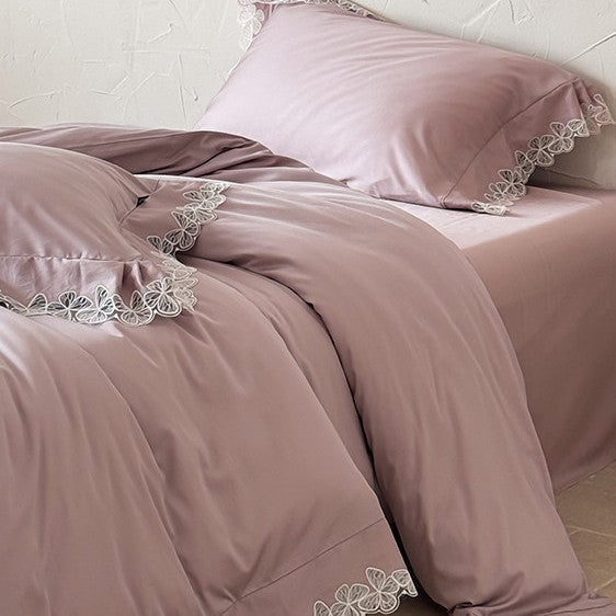 Luxurious cotton satin bed linen set with fine lace border