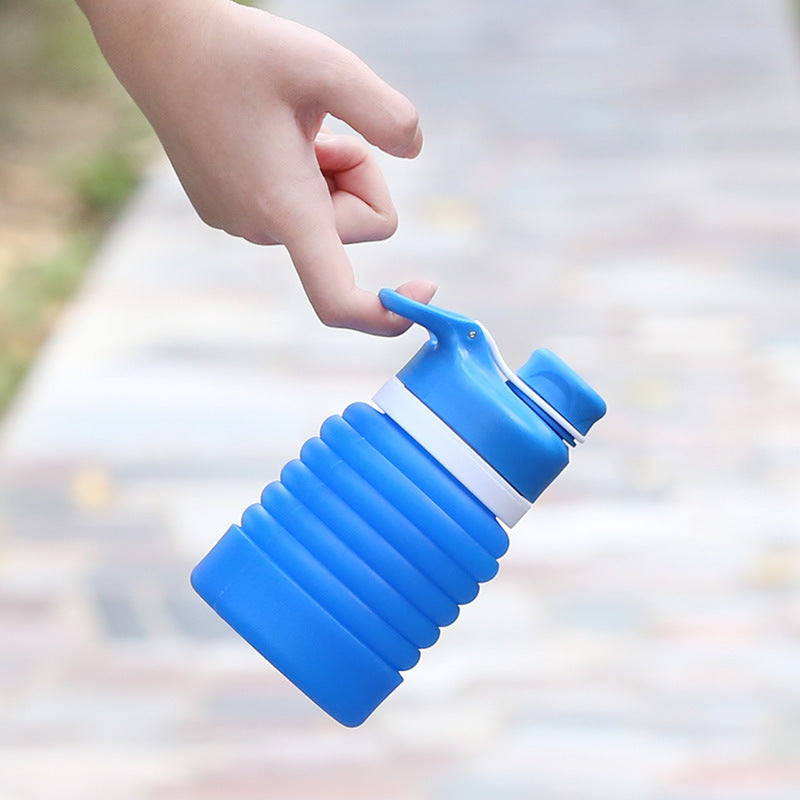 Siopsrl | Collapsible silicone water bottle with ergonomic ribbed grip and flip-top spout Siopsrl