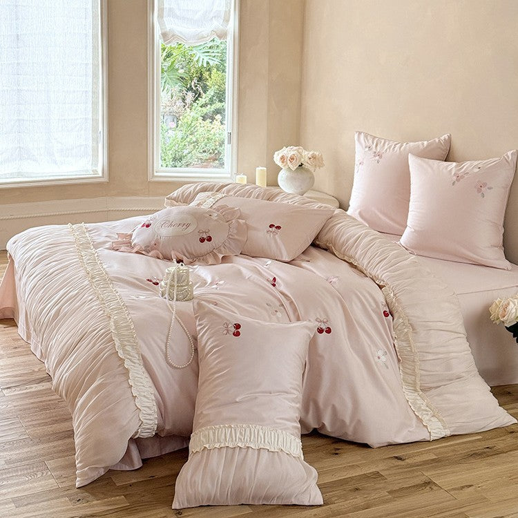 Luxurious satin bedding set with gathered ruffle, cherry embroidery and decorative pillow