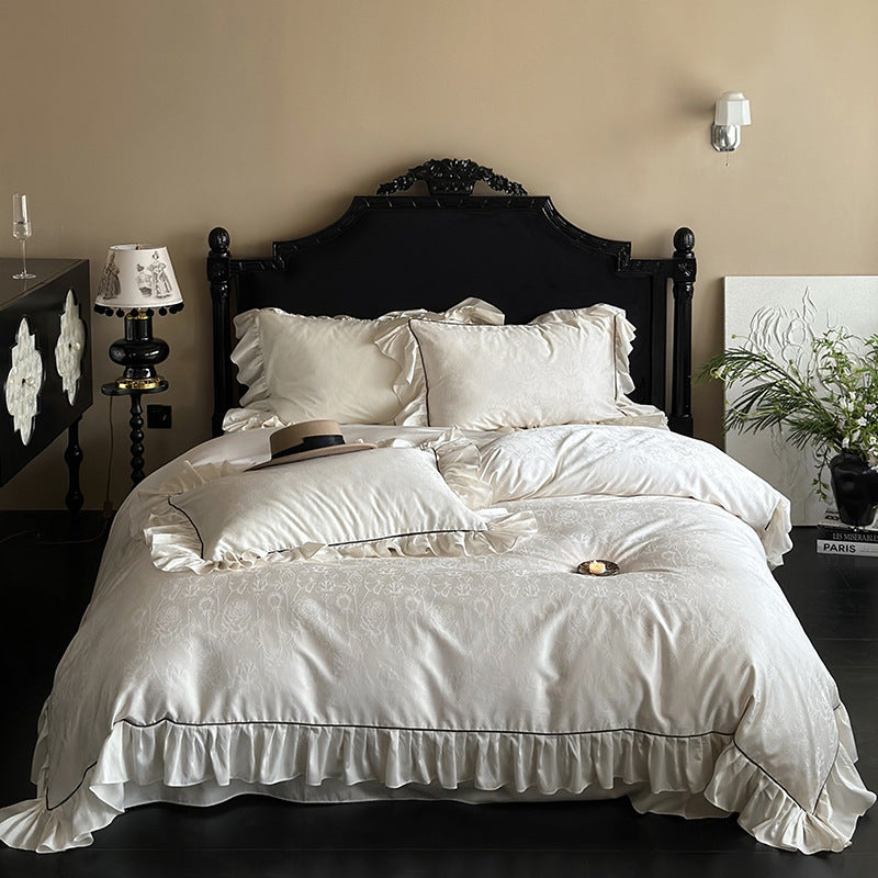 Luxurious bedding set with ruffles and jacquard pattern
