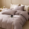 Embroidered bedding set made of cotton satin with floral vine embroidery