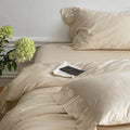 Bedding set made of cotton satin with ruffle, subtle jacquard floral relief and silky-matt finish