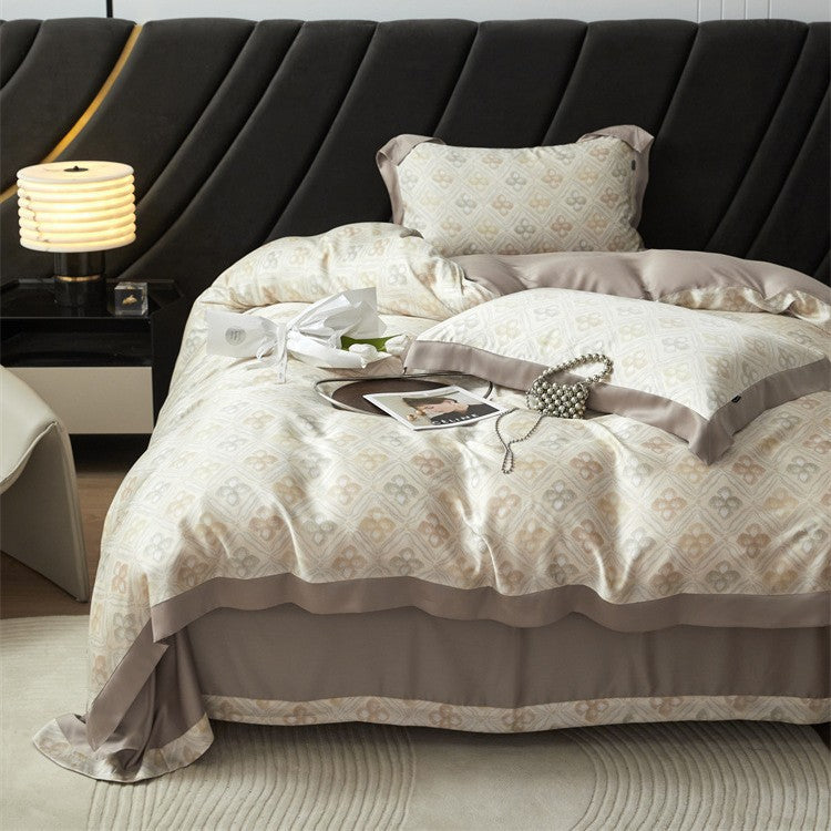 Luxurious satin bedding set with geometric jacquard pattern and satin trim Bowlift