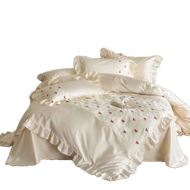 Romantic cotton satin bed linen set with ruffle, decorative panel and delicate animal print Bowlift