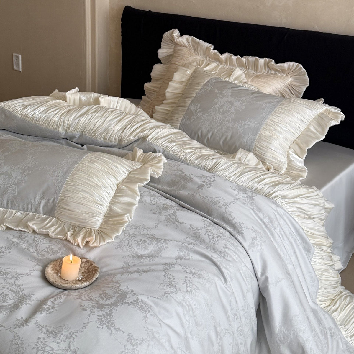 Luxurious ruffled satin bedding set with jacquard pattern and pleated edges