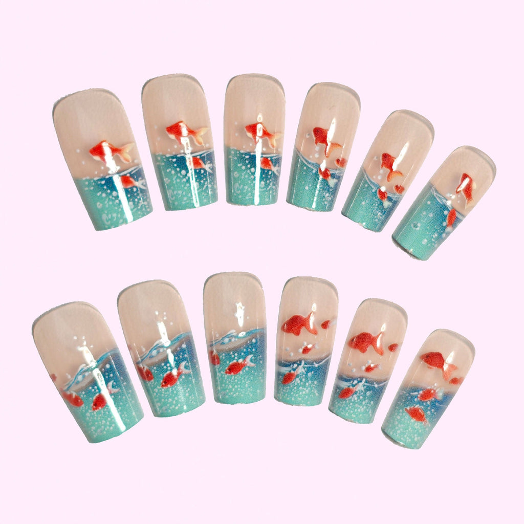 Siopsrl | Artifical nails with maritime goldfish design Siopsrl
