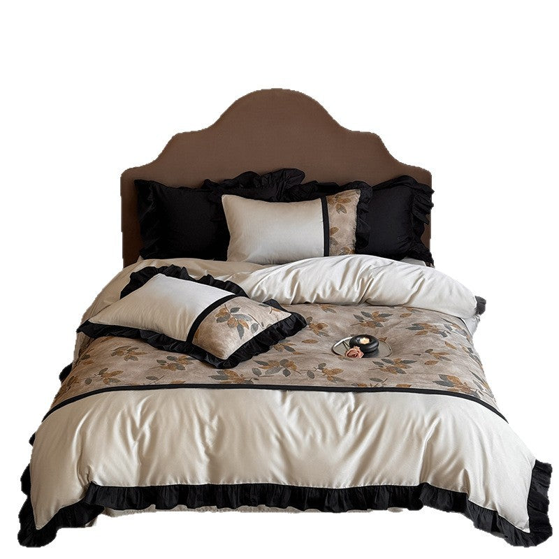 Premium bedding set made of fine satin with botanical jacquard and decorative ruffle Bowlift