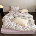 Floral cotton bedding set with quilted blanket and pillowcases