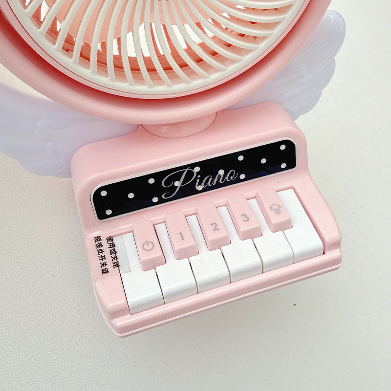 Siopsrl | Portable table fan in playful piano design Siopsrl