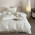 Bedding set made of cotton muslin with ruffles and playful animal print