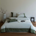 Bedding set made of cotton satin with decorative hem and decorative pillow