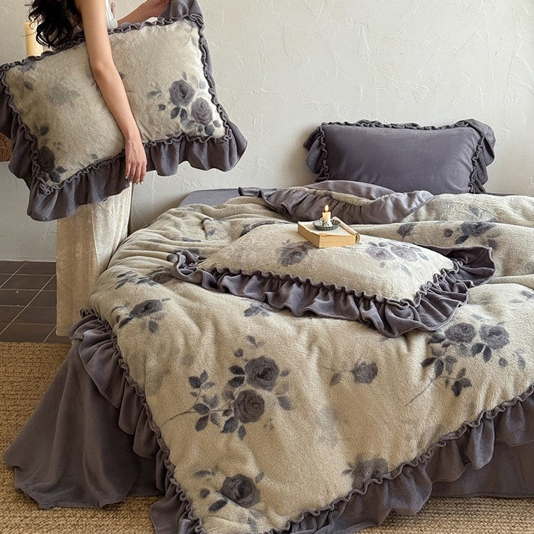 Microfleece bedding set with floral velour relief and decorative trim