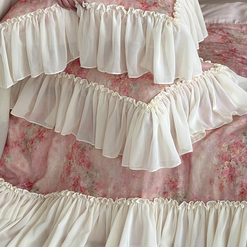 Romantic satin bedding set with floral watercolor print and lavish chiffon ruffle