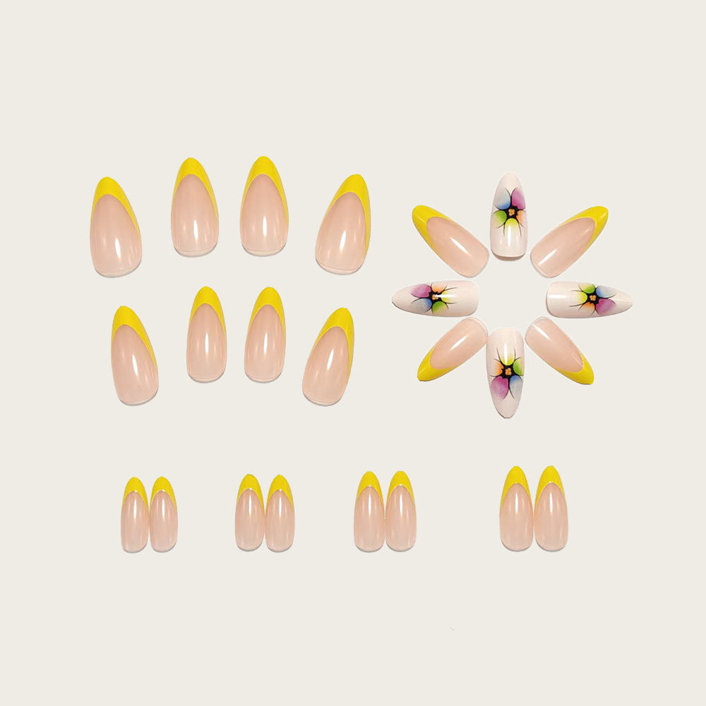 Siopsrl | Stylish artificial nails with floral accents and colorful French tip design Siopsrl