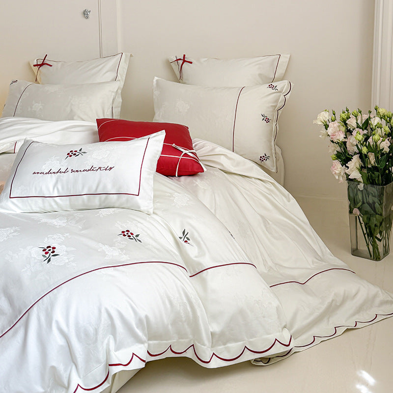 Bedding set with fine embroidery and contrasting piping