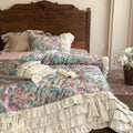 Luxurious bedding set with ruffles, bed skirt, and floral print