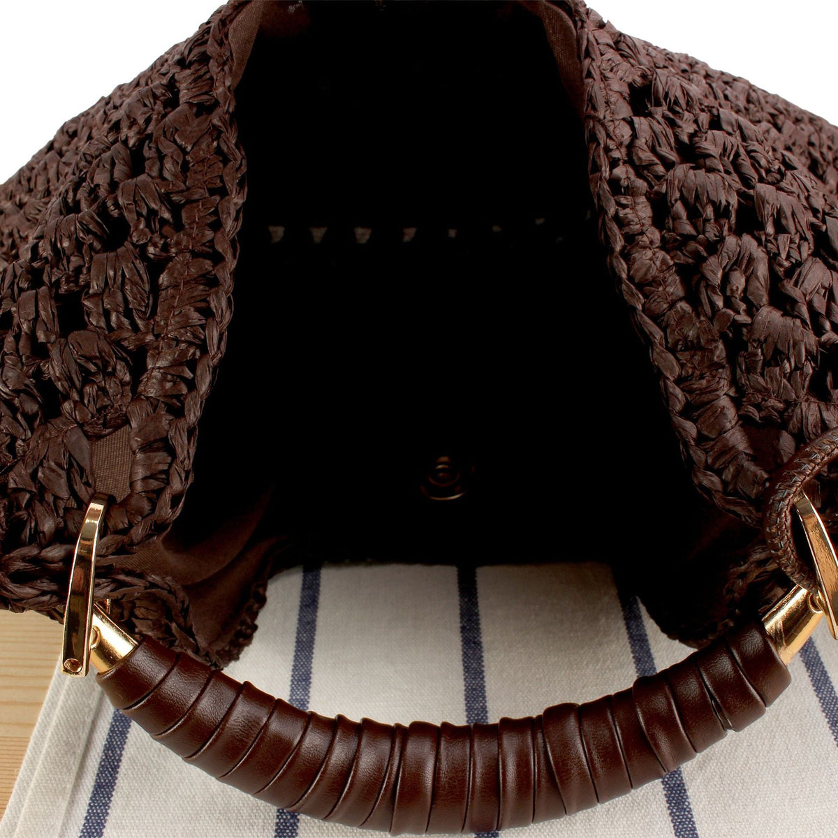 Siopsrl | Handbag Made from Handcrafted Natural Material with Unique Tassel Pendant Siopsrl