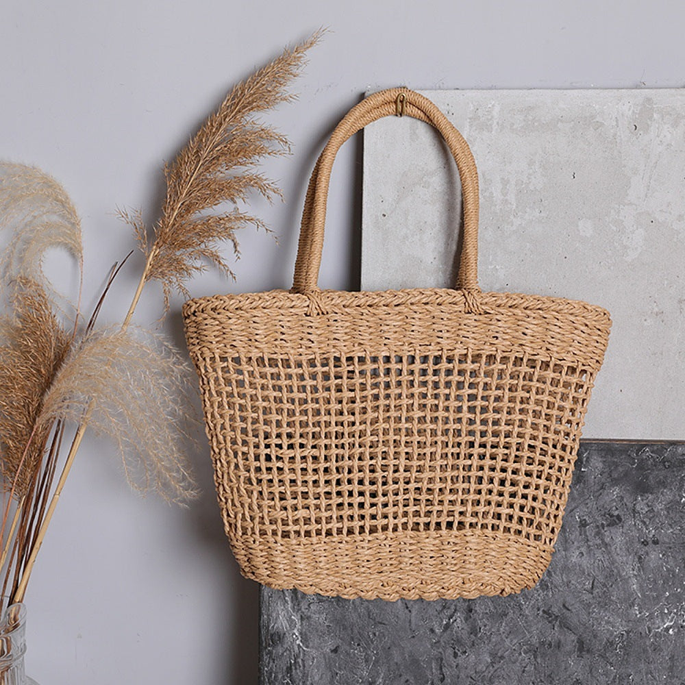 Basket bag made of natural raffia with sturdy carrying handles Siopsrl