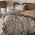 Quilted duvet cover set with ruffle and delicate floral pattern