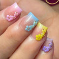 Siopsrl | Spring-like nail art with flower appliqués Siopsrl